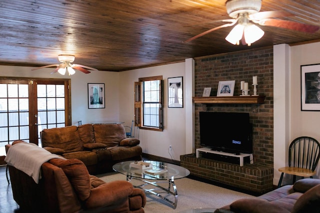 living room featuring ceiling fan, a healthy amount of sunlight, wood ceiling, and french doors