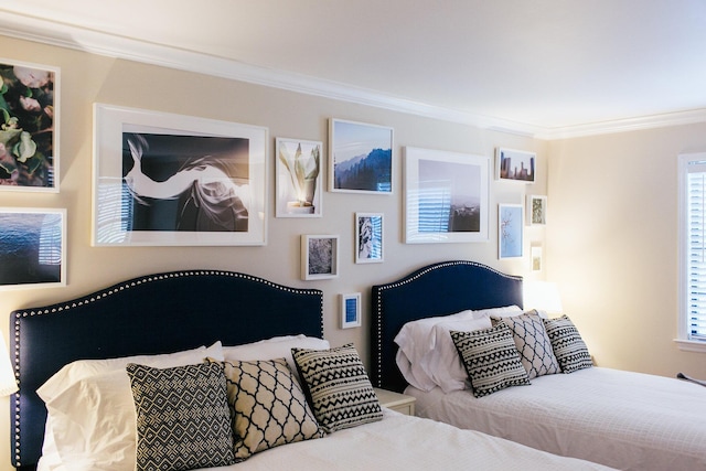 bedroom with ornamental molding