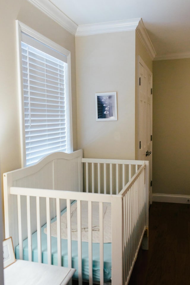 bedroom featuring crown molding