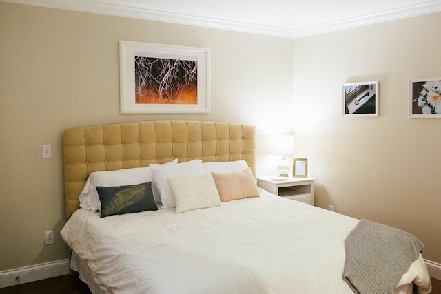 bedroom with ornamental molding