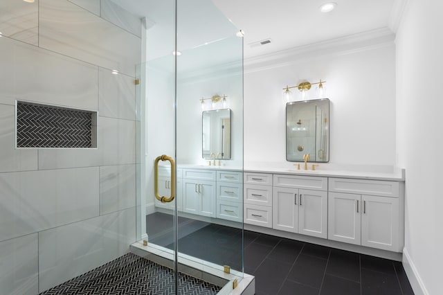 bathroom with tile patterned flooring, vanity, a shower with shower door, and ornamental molding