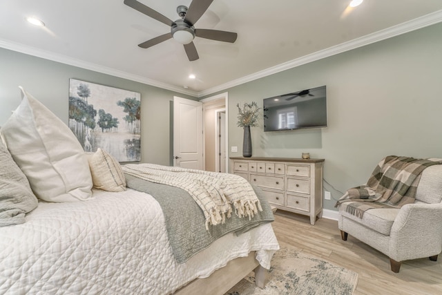 bedroom featuring ornamental molding, ceiling fan, and light hardwood / wood-style flooring