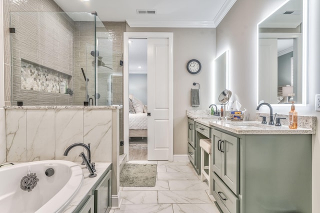 bathroom with vanity, ornamental molding, and shower with separate bathtub