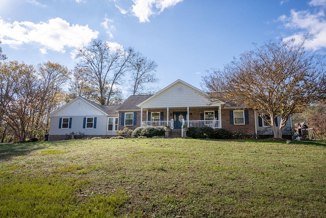 ranch-style house with a porch and a front yard