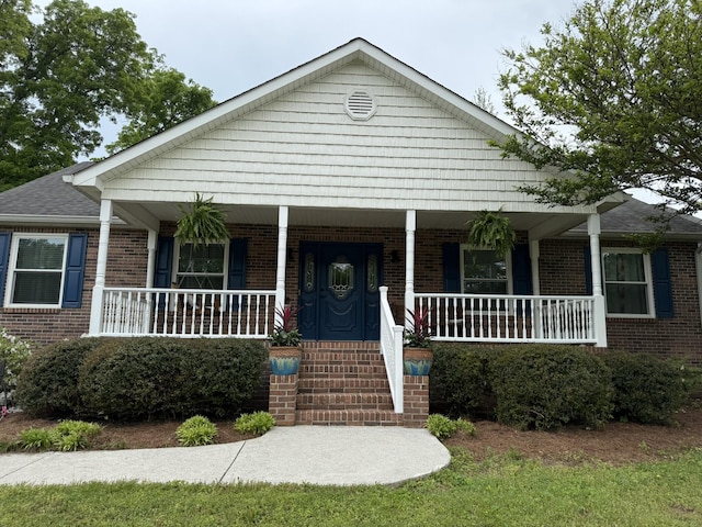 30 Meadowbrook Ln, Trenton, GA 30752 - view of front facade with covered porch and brick siding