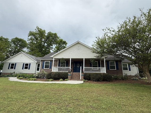 30 Meadowbrook Ln, Trenton, GA 30752 - ranch-style house with a porch, a front yard, and brick siding