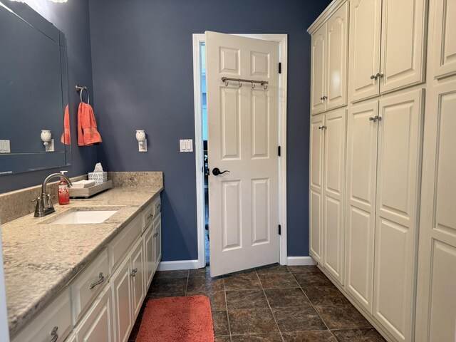 30 Meadowbrook Ln, Trenton, GA 30752 - bathroom featuring baseboards and vanity