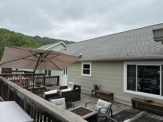 30 Meadowbrook Ln, Trenton, GA 30752 - wooden terrace with an outdoor living space with a fire pit