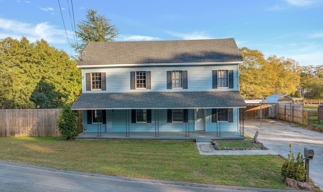 view of front facade with a porch and a front lawn