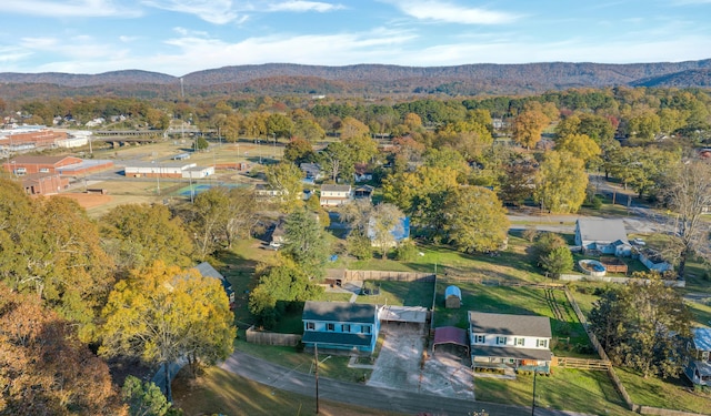 birds eye view of property featuring a mountain view