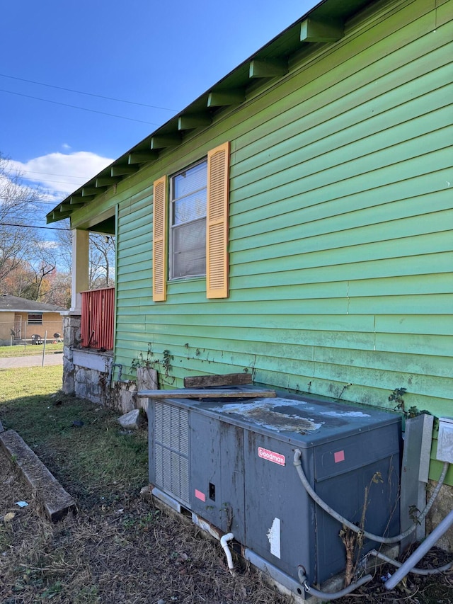 view of side of property with central AC unit