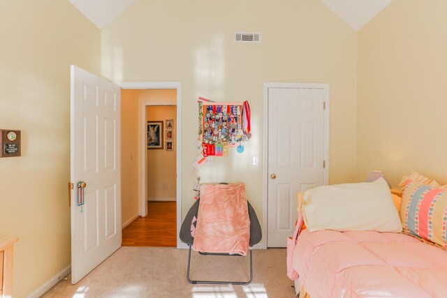 289 Magnolia Pl, Ringgold, GA 30736 - bedroom with high vaulted ceiling, light colored carpet, and baseboards