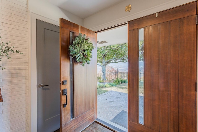 doorway to outside featuring plenty of natural light