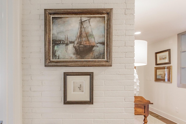 interior details with hardwood / wood-style flooring