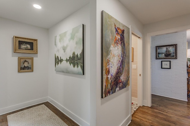 corridor with dark wood-type flooring