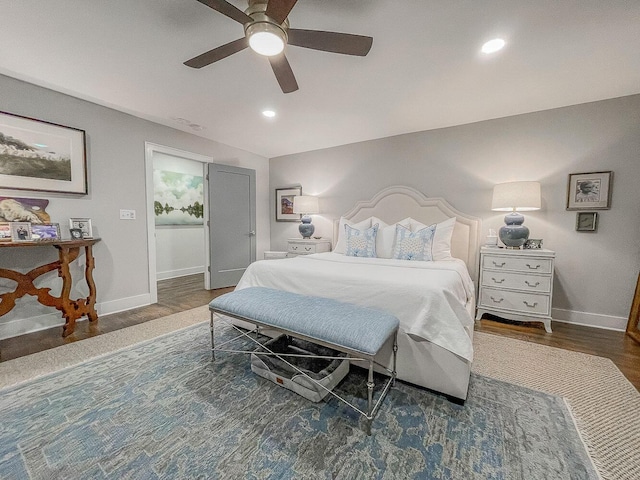 bedroom featuring ceiling fan and dark wood-type flooring