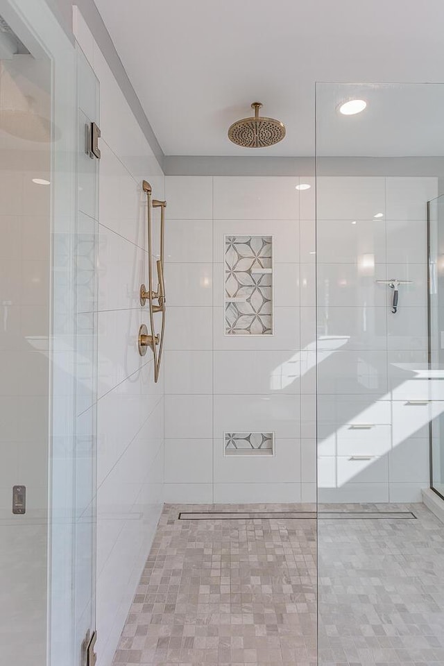 bathroom featuring walk in shower