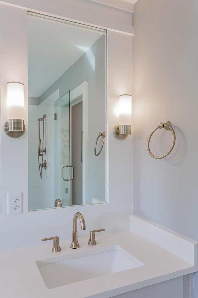 bathroom featuring vanity and walk in shower