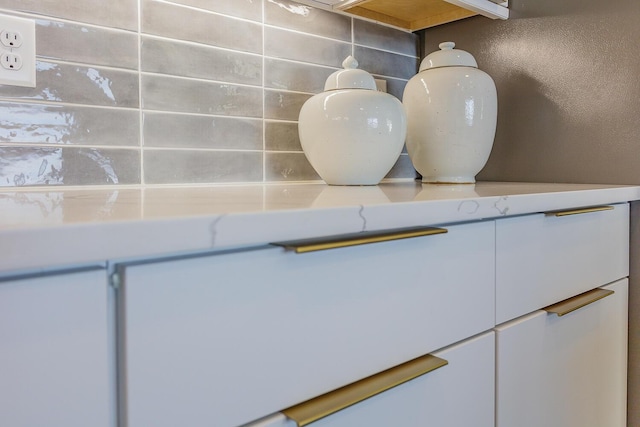 interior details featuring backsplash