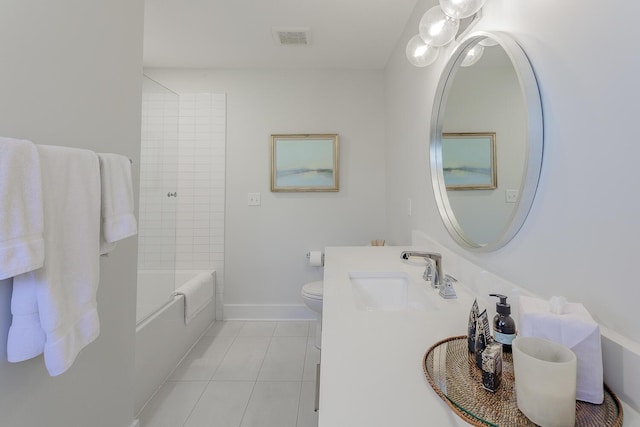 full bathroom with tile patterned flooring, vanity, toilet, and tiled shower / bath