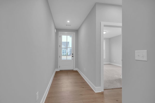 doorway to outside featuring light hardwood / wood-style flooring