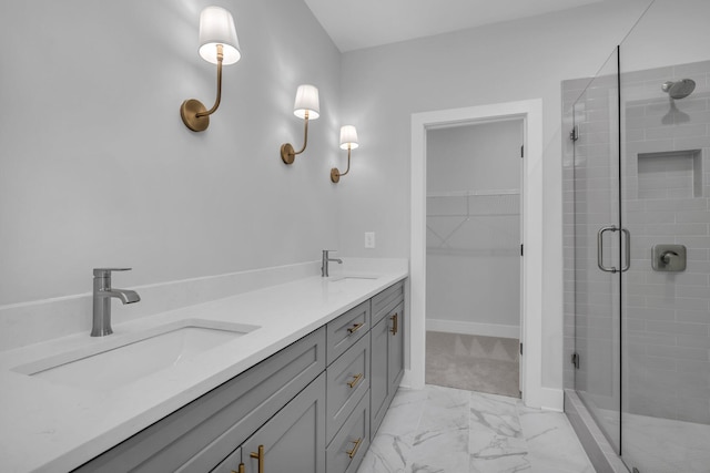 bathroom featuring vanity and a shower with shower door