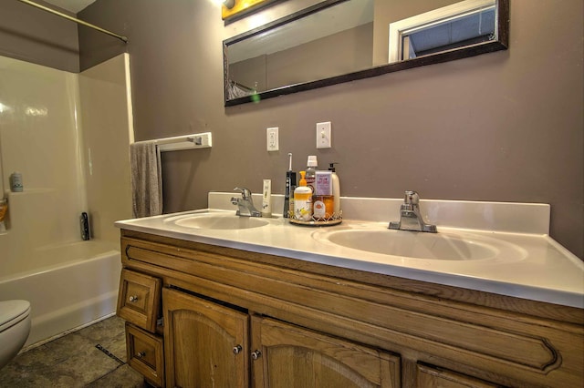 full bathroom with tile patterned flooring, shower / bathing tub combination, vanity, and toilet