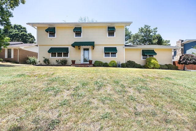 view of front property with a front yard