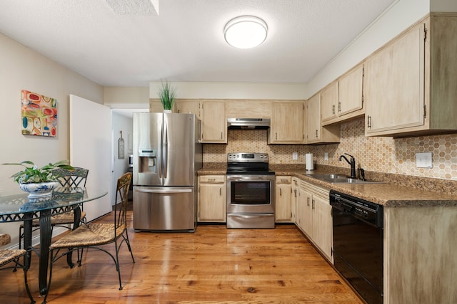 kitchen featuring sink, light brown cabinets, stainless steel appliances, light hardwood / wood-style flooring, and range hood