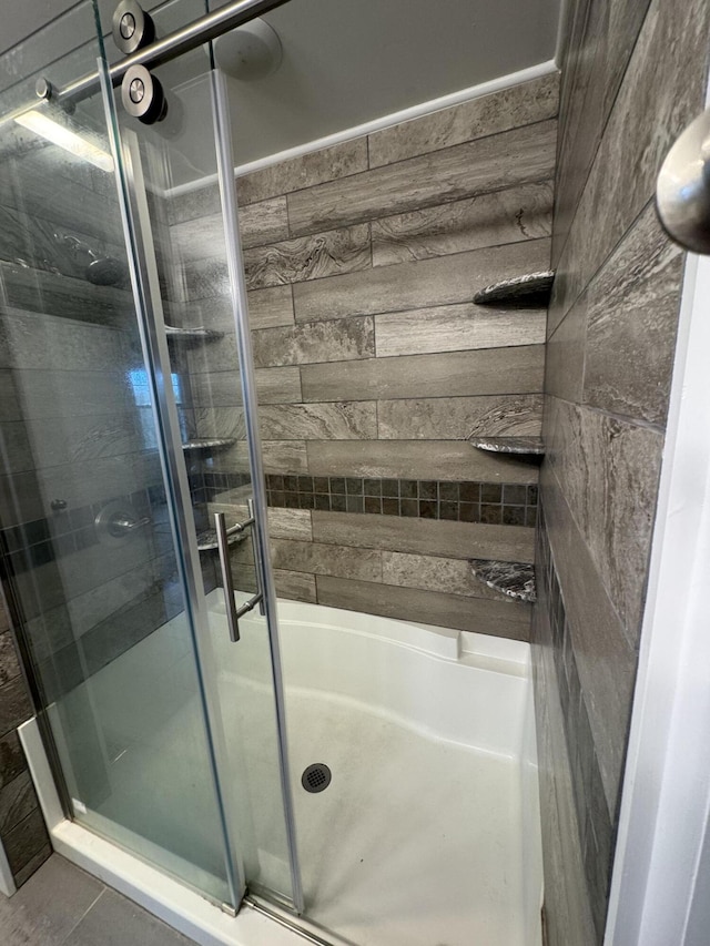 bathroom featuring separate shower and tub and tile patterned flooring