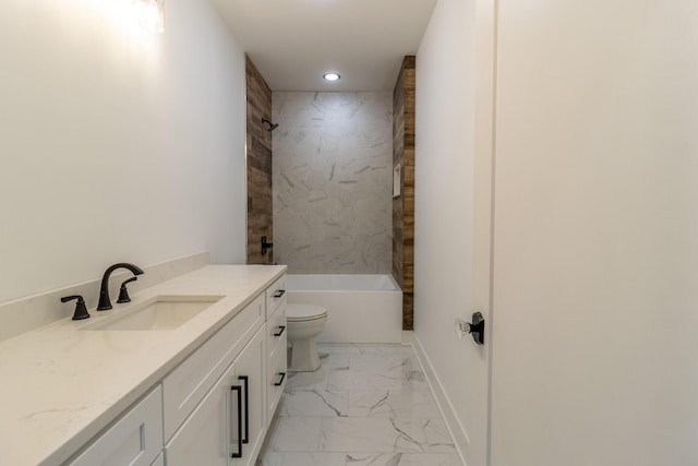 full bathroom with vanity, toilet, and tiled shower / bath