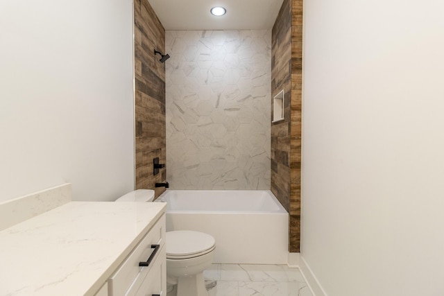 full bathroom featuring vanity, toilet, and tiled shower / bath