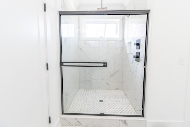 bathroom featuring walk in shower