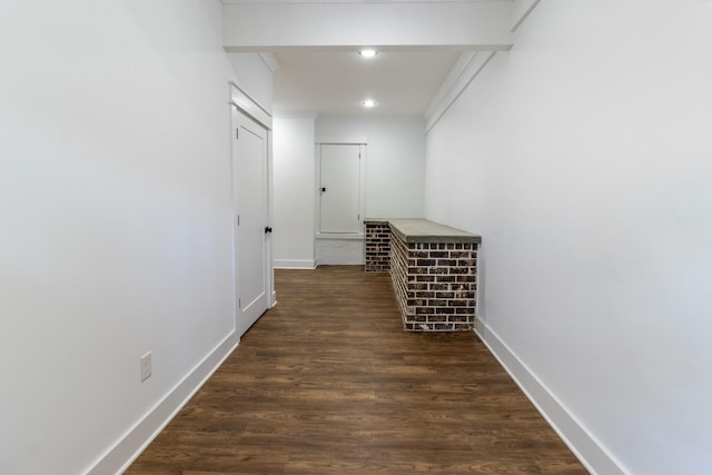 hall with dark hardwood / wood-style floors