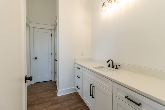 bathroom featuring hardwood / wood-style floors and vanity