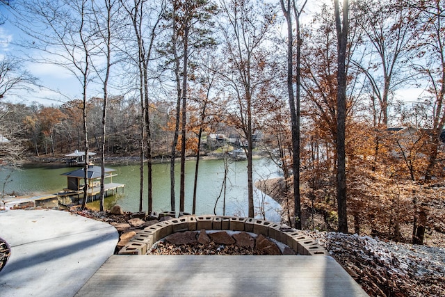 view of water feature with a dock