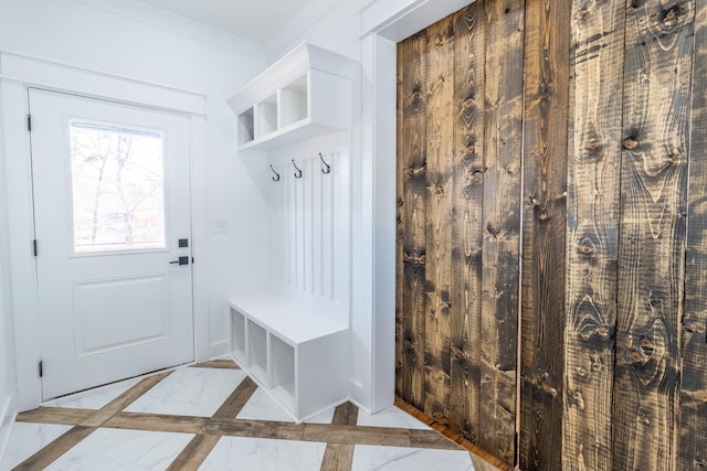 mudroom featuring crown molding