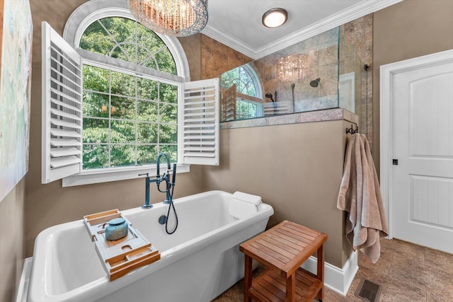 bathroom with plus walk in shower, a wealth of natural light, and crown molding