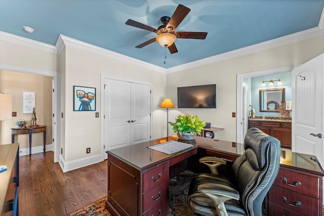 office area featuring crown molding, ceiling fan, and dark wood-type flooring