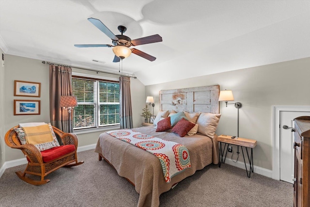 bedroom featuring lofted ceiling, crown molding, carpet floors, and ceiling fan