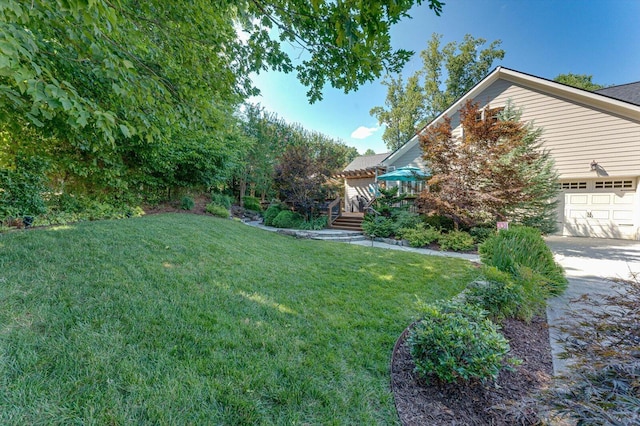 view of yard featuring a garage