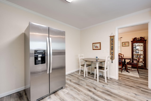 5004 Kenton Dr, Chattanooga, TN 37412 - kitchen with stainless steel refrigerator with ice dispenser, light wood-style floors, ornamental molding, and baseboards