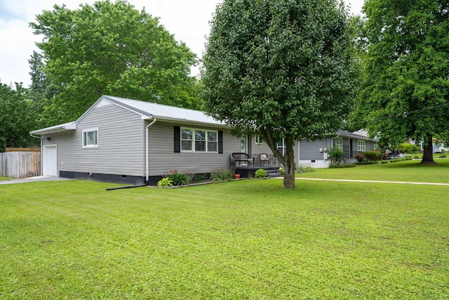 ranch-style home with a front lawn