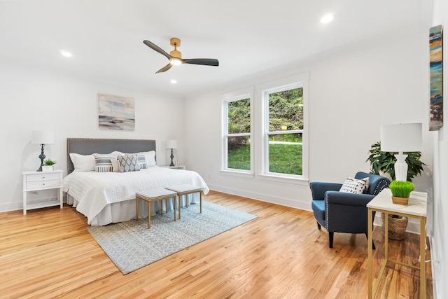 bedroom featuring ceiling fan and light wood-type flooring