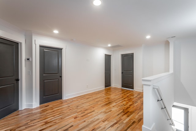 spare room with light hardwood / wood-style flooring