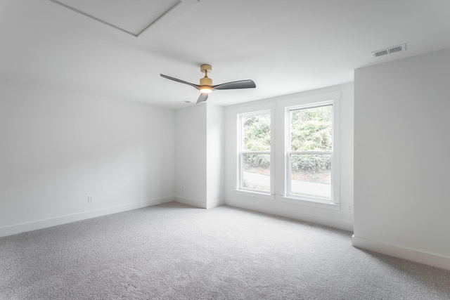 carpeted empty room with ceiling fan