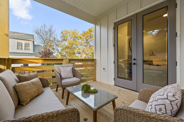 balcony featuring french doors