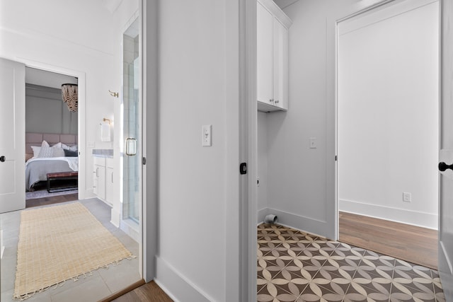 hallway featuring hardwood / wood-style flooring