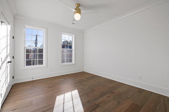 spare room featuring ceiling fan, hardwood / wood-style floors, and ornamental molding