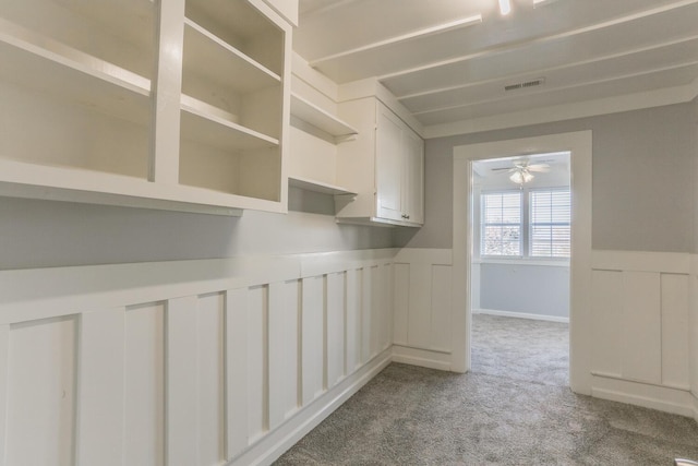 interior space featuring light colored carpet